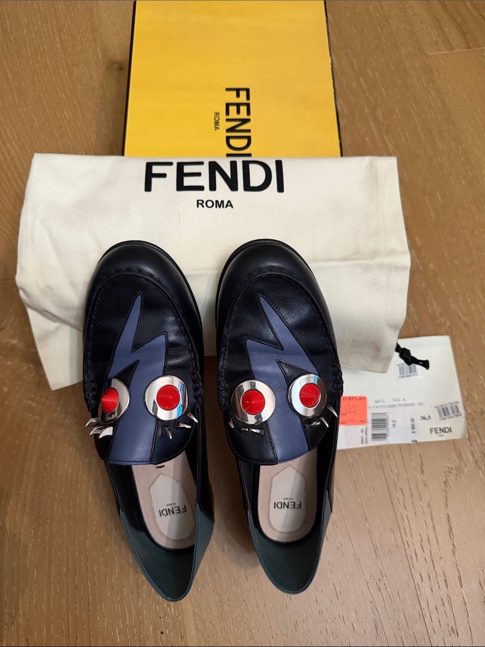 Fendi Black Leather Loafers with Blue Lightning and Red Eye Accents